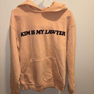 TALENTLESS Peach Sweater with Black Text
